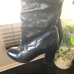 Black leather thigh high boots. Great for winter